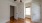 Bedroom with wood floors and closets