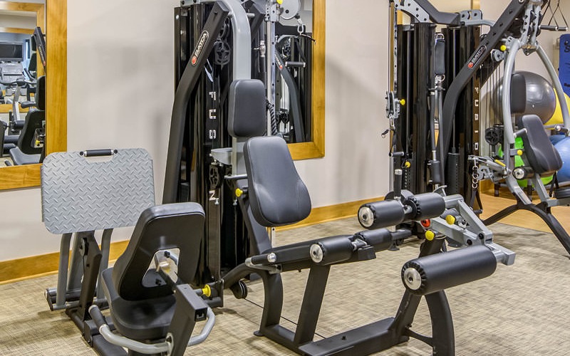 large fitness center with ample lighting